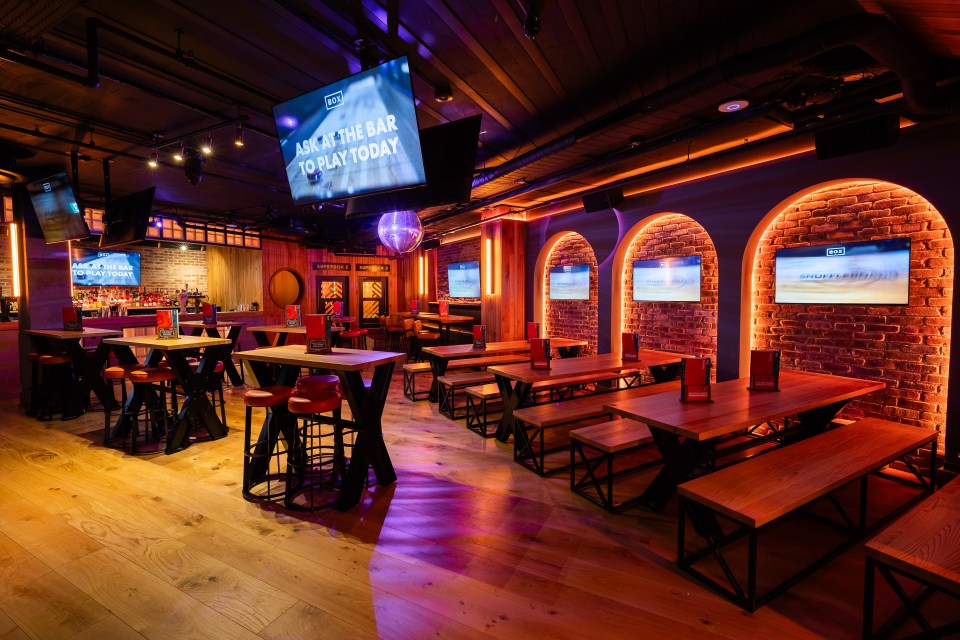 Laurence Howe captured cardboard box marked 21102025 in a warehouse, highlighting logistics and packaging themes.