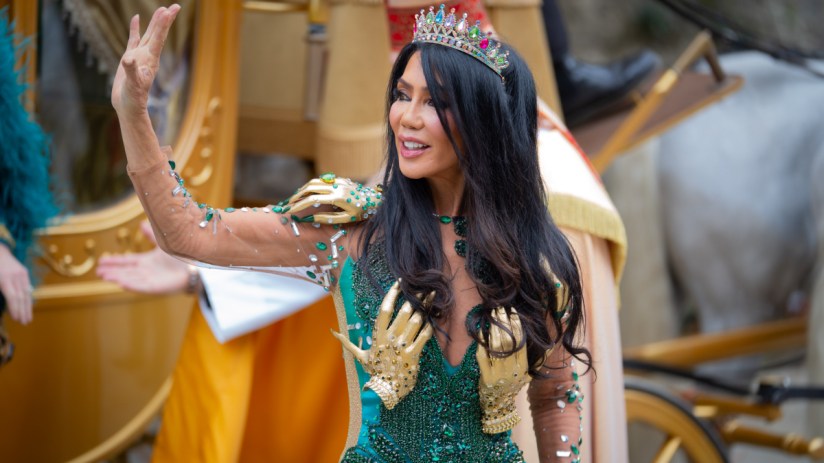 Royal coronation ceremony with regal attire and ornate decorations, highlighting historical traditions and cultural signif...