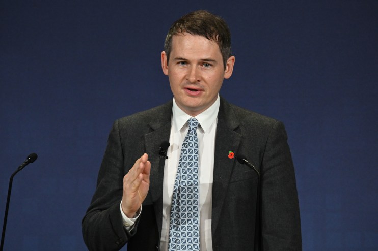 Ian Hogarth in a business setting, highlighting his role in the news, with neutral background and professional attire.