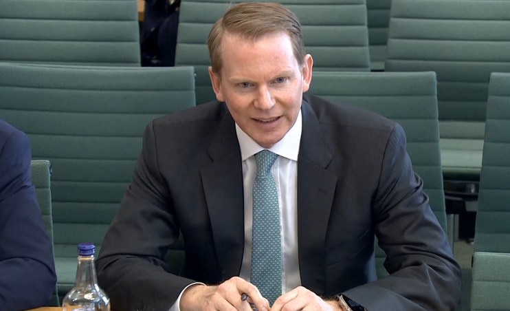 Breaking news report with text overlay on a digital screen, representing current events in a modern business environment