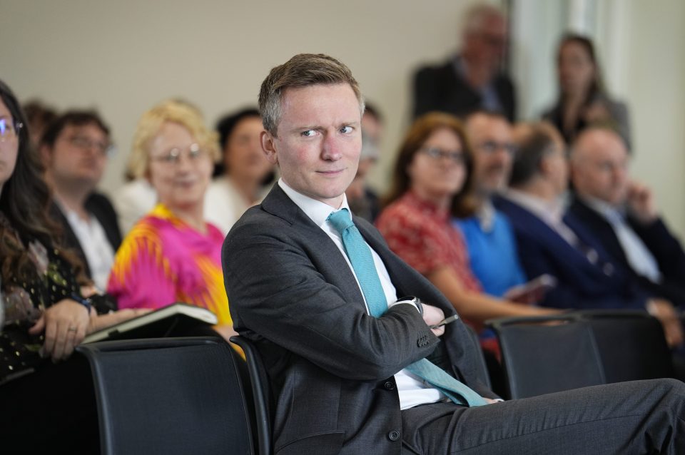 Breaking news graphic with bold headlines and dynamic design elements, representing a major news update in the general cat...