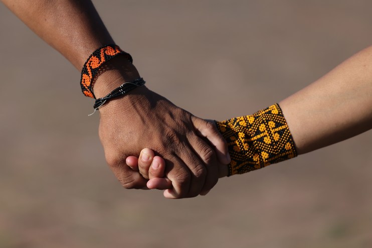 COP30 delegates discuss climate solutions and poverty reduction strategies at an international summit.