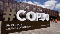 Delegates discuss climate strategies at COP30 conference with global leaders in a modern, sustainable venue.