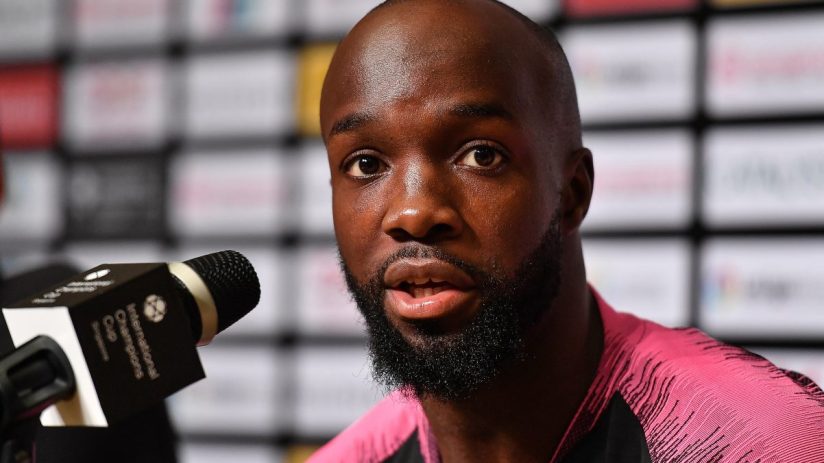 Professional setting with businesspeople engaged in a meeting, highlighting collaboration and corporate strategy