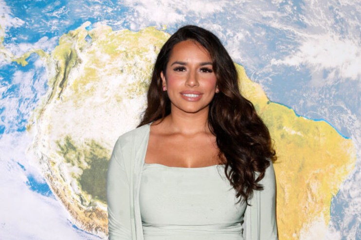 Business professionals collaborating in modern office setting, highlighting teamwork and innovation in a corporate environ...