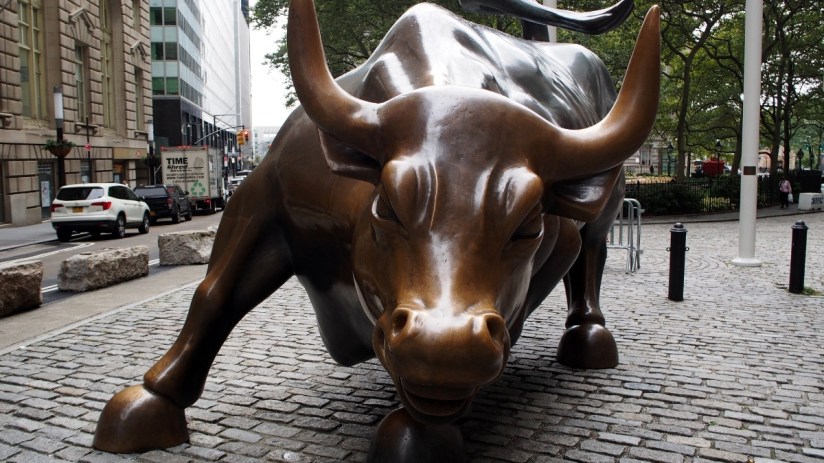 GettyImages 1908809125 showing a dynamic business meeting with diverse professionals discussing strategies at a modern con...