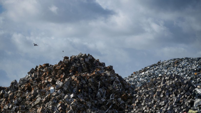 Getty Images archive showing a diverse group of business professionals engaged in a dynamic brainstorming session in a mod...