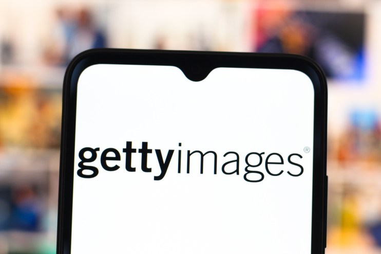 Getty Images logo displayed on a smartphone screen against a blurred background, representing digital media content.