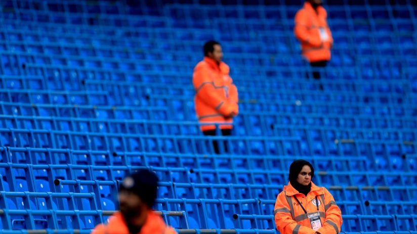 GettyImages 2207073438: Business professionals discussing strategy in modern office setting, emphasizing collaboration and...