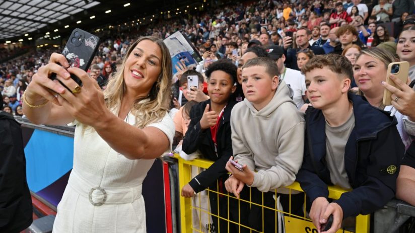 GettyImages 2220300015 professional business meeting in modern office with diverse team discussing strategy around confere...