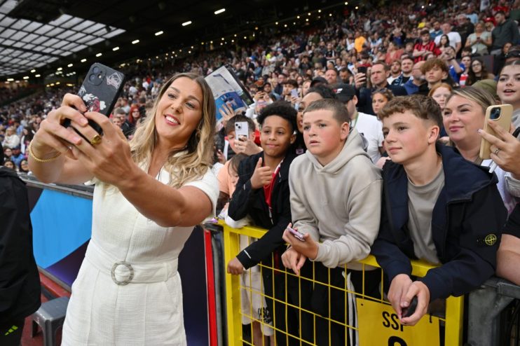 GettyImages 2220300015 professional business meeting in modern office with diverse team discussing strategy around confere...