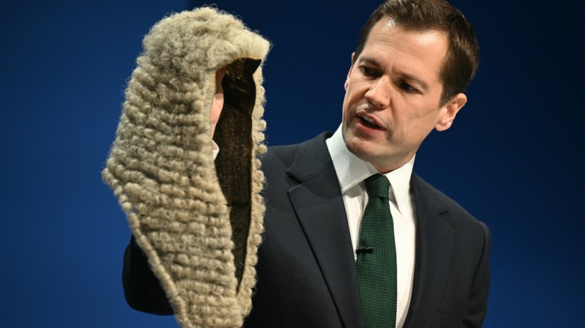 Breaking news event with diverse business professionals engaged in a dynamic discussion at a corporate conference setting