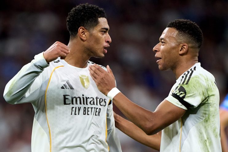 GettyImages 2244678529 showing a dynamic business meeting with diverse professionals discussing strategies in a modern off...