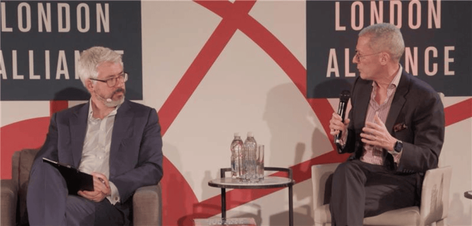 London business opportunity panel session discussing economic growth and investment strategies, featuring expert speakers.