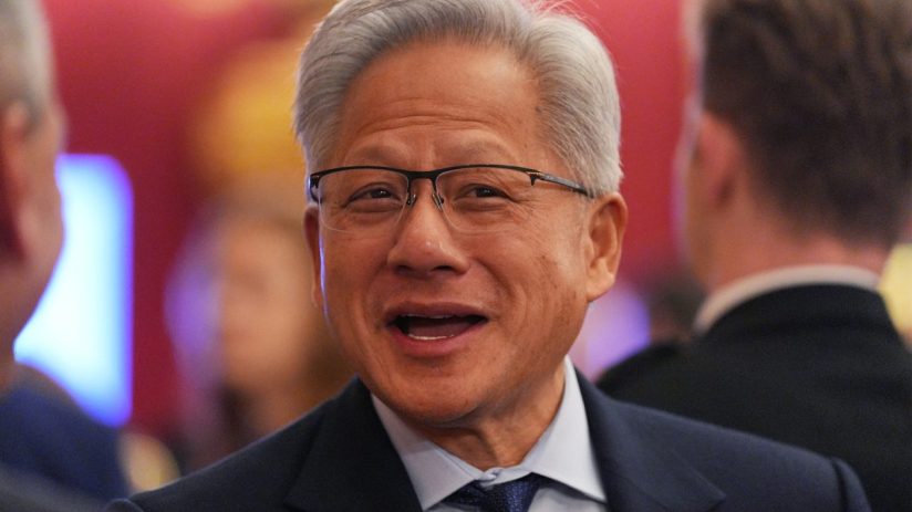 Nvidia CEO Jensen Huang presenting at a conference, showcasing Nvidias latest technological advancements and innovations