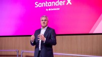 SantanderX 2023 event showcasing innovation and entrepreneurship with attendees networking and exchanging ideas