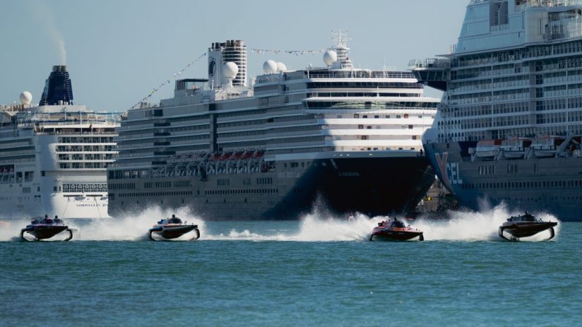 Birgit Dieryck in innovative spacesuit showcases advanced technology for space exploration at media event.