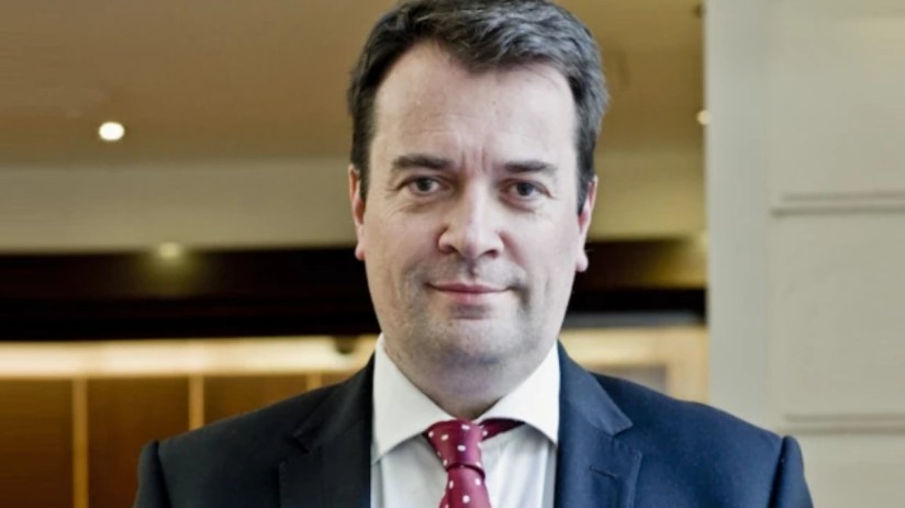 General news-related image depicting a diverse group discussing current events, highlighting inclusive dialogue in media.