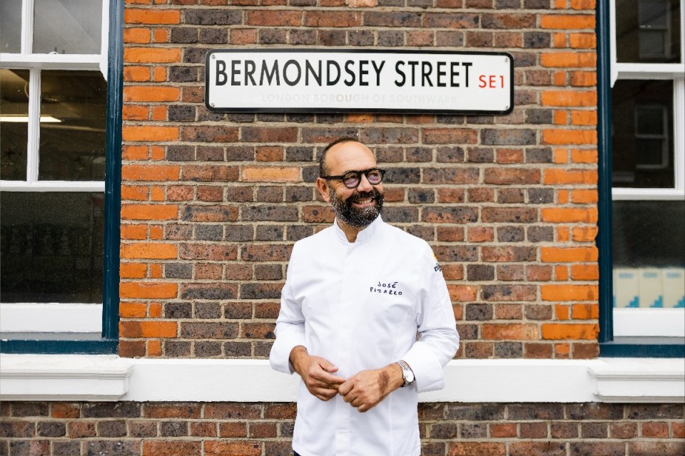 Chef José Pizarro in action at his restaurant kitchen, showcasing culinary expertise and vibrant Spanish dishes.