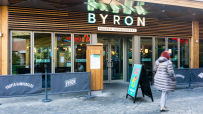Byron Burger restaurant branch interior featuring modern design and dining area, highlighting brand ambiance and style