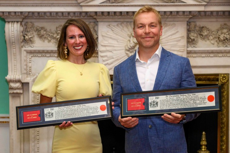 Chris Hoy delivering keynote speech at business conference, June 2025, addressing industry leaders and professionals.