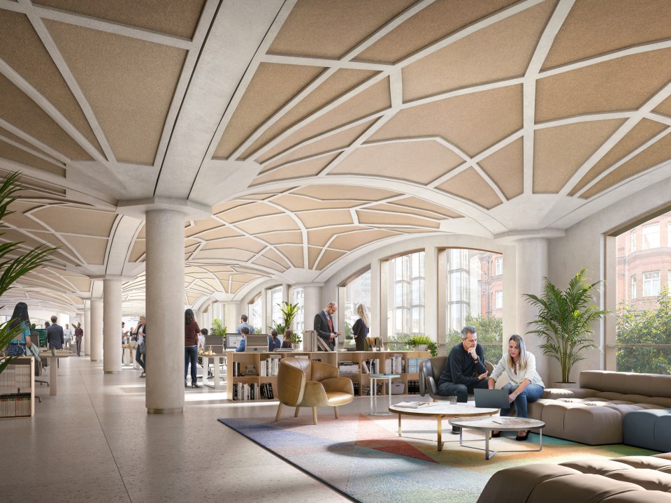 Modern office interior with stylish furniture, open workspace, and large windows at Kiasm, showcasing a collaborative envi...