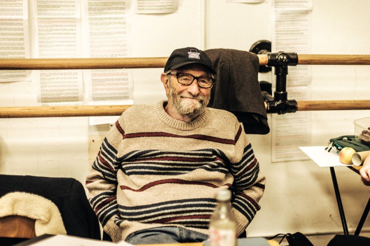 Eric Roth rehearsing for High Noon with cast members, captured by Justine Matthew, showcasing theatrical preparation.