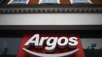 Argos storefront showcasing the latest product displays and promotional banners in a bustling city center location