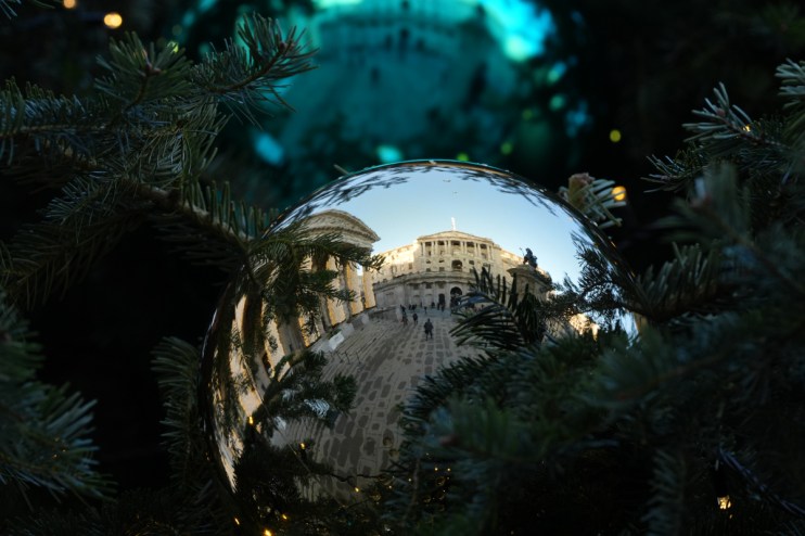 Bank of England building adorned with festive Christmas decorations during winter holiday season