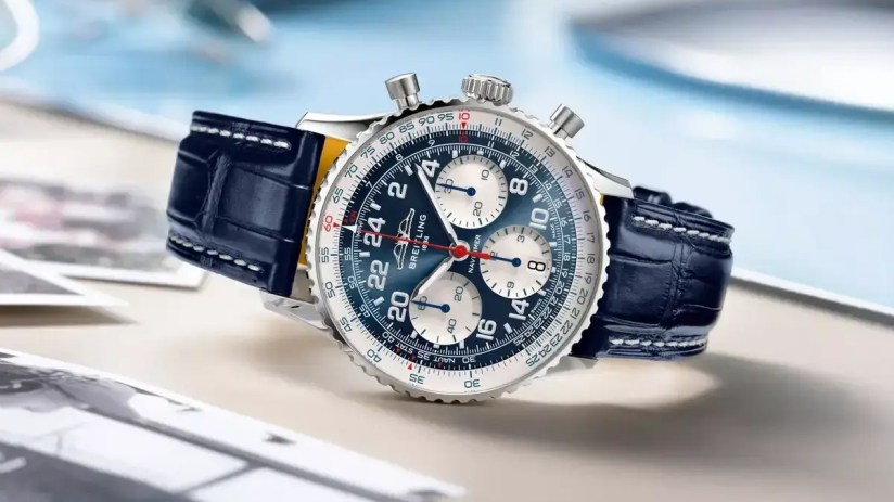 Breitling luxury watch with stainless steel case, black dial, and leather strap showcasing precision craftsmanship