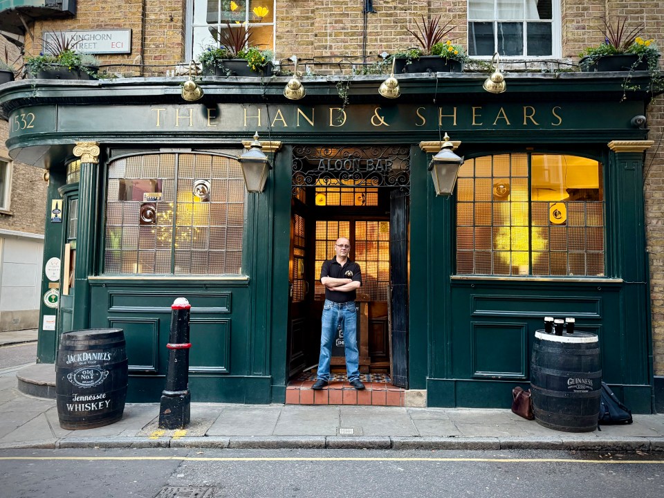 Carl Hanley receiving recognition from Harry James Relf at a business event, highlighting notable achievements.