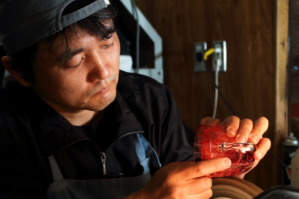 Intricate Edo Kiriko glassware showcasing traditional Japanese craftsmanship and vibrant geometric patterns