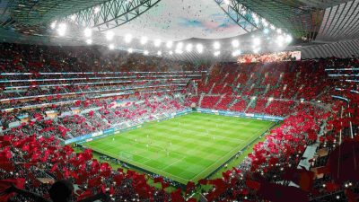 Grand Stade Hassan II showcasing modern architecture and design in a vibrant urban setting, reflecting cultural significance.