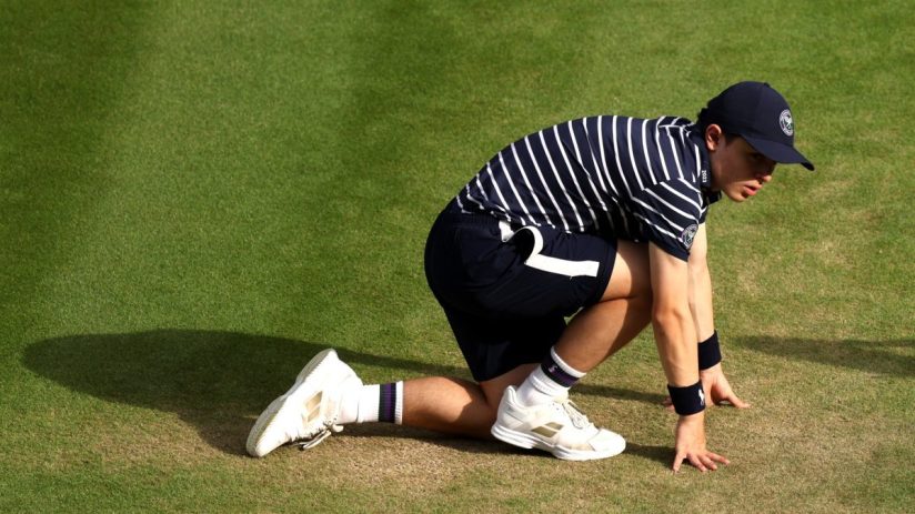 Breaking news conference podium with microphones and news outlet logos, focusing on current events and media coverage