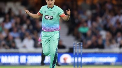 GettyImages 2165915353 showing a significant business meeting with diverse professionals discussing financial strategies