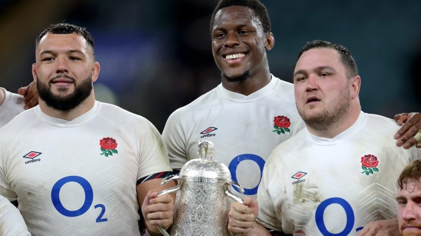 Breaking news coverage with illustrative Getty Images backdrop featuring dynamic business and economic themes.