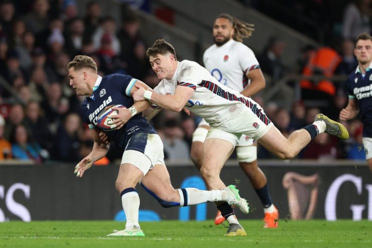 GettyImages 2201341209 depicts a dynamic business meeting with diverse professionals collaborating in a modern office sett...