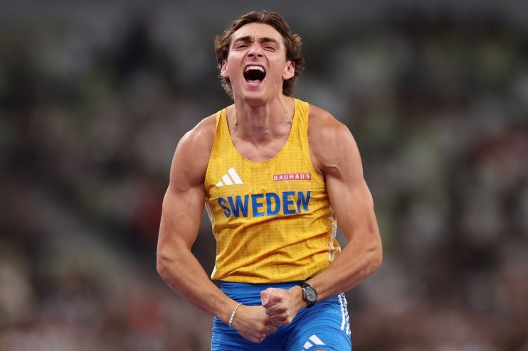 GettyImages 2237037423 showing dynamic business meeting with diverse team discussing innovative strategies in modern offic...