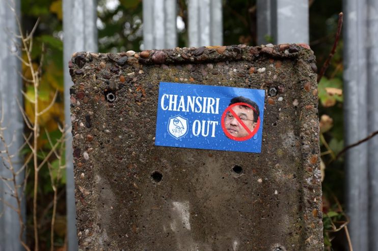 General news article image depicting a dynamic business scene, capturing professionals collaborating in a modern office se...