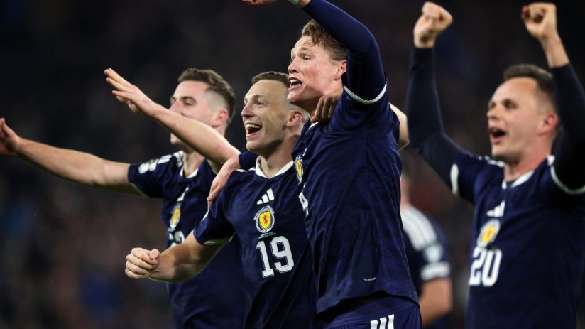 Getty Images stock photo showcasing a business meeting with diverse professionals collaborating in a modern office setting.
