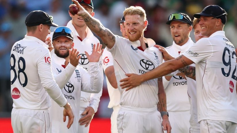 GettyImages 2247755589 shows a dynamic news event scene with diverse individuals engaged in a business discussion.