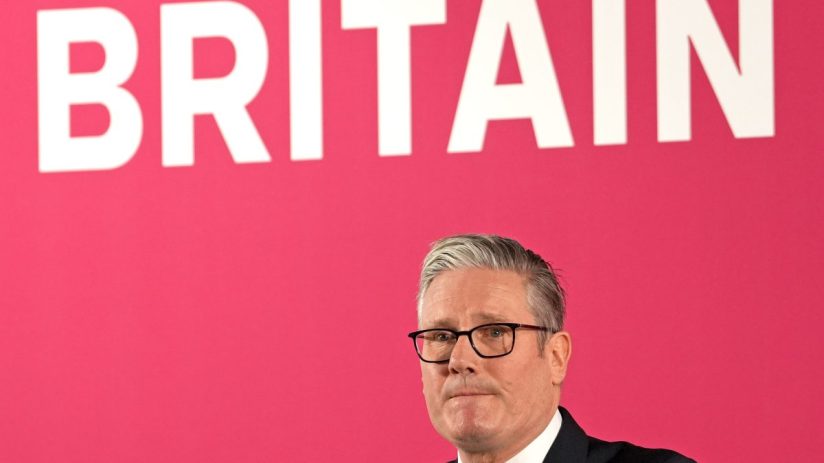 GettyImages 2248745606 showcasing a significant business event with diverse professionals engaged in a dynamic discussion