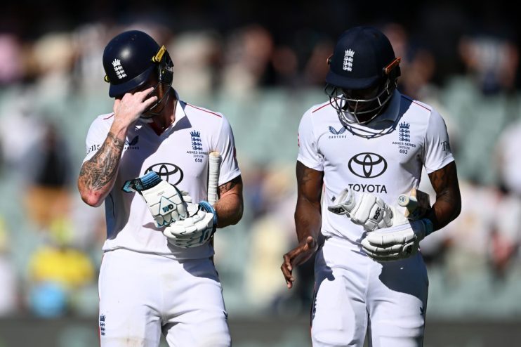 GettyImages 2252488974 showing a corporate conference room with executives engaged in a business meeting discussing strate...