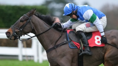 Hazy sky over cityscape with smoke clouds from nearby wildfire, highlighting urban air quality concerns