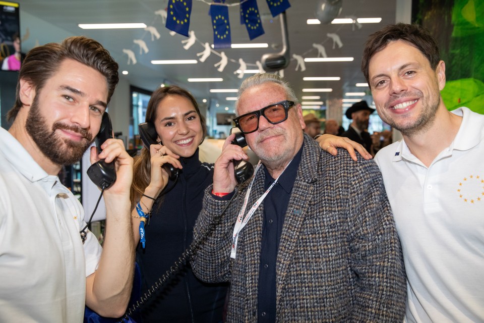 Ray Winstone attending ICAP charity event, dressed formally, engaging with attendees, supporting fundraising efforts