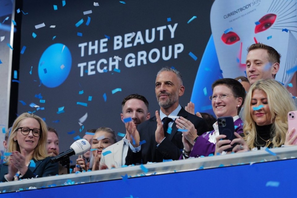 Laurence Newman, CEO of The Beauty Tech Group, at London Stock Exchange opening on October 3, 2025, wearing a suit and tie