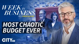 Business meeting with executives discussing chaotic budget decisions, highlighting financial documents and graphs on a table.