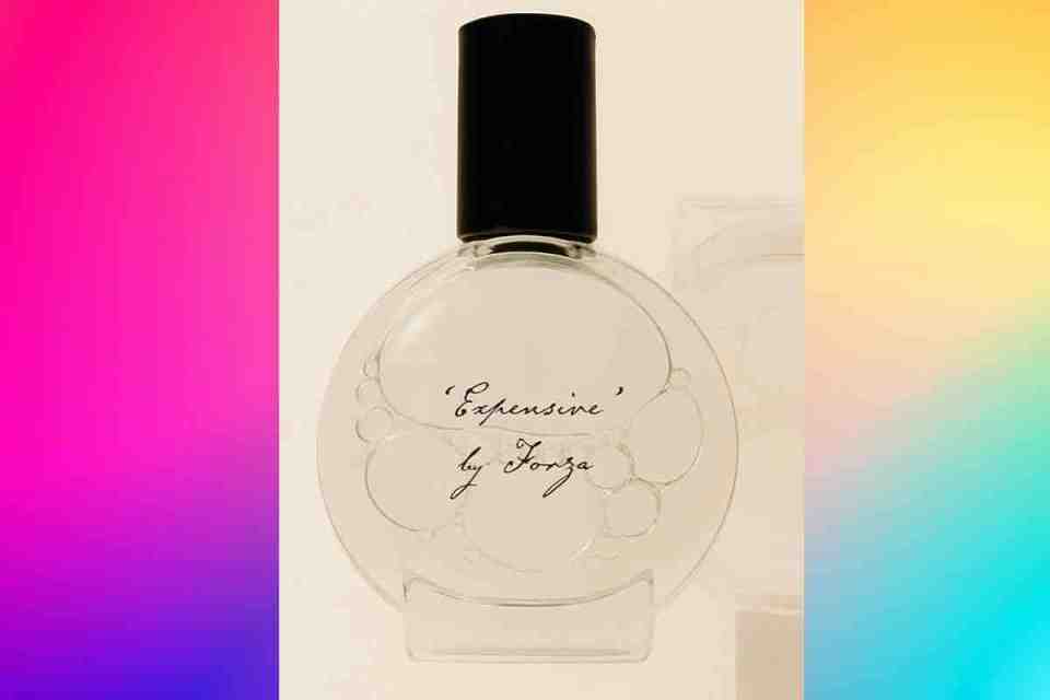 Luxurious and elegant perfume bottles showcasing an exclusive collection of expensive fragrances displayed on a glass shelf