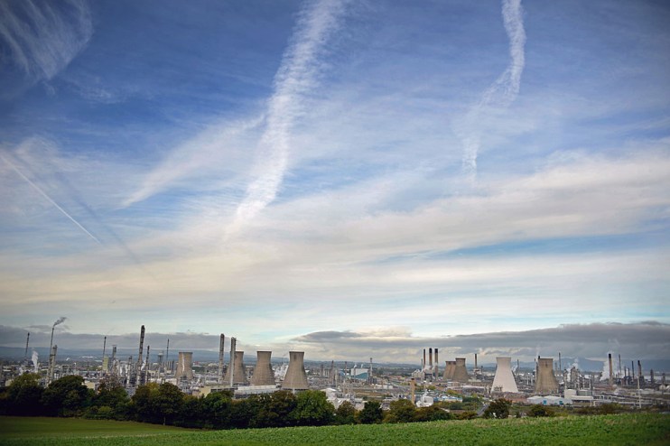 INEOS Grangemouth industrial site with chemical plant infrastructure and storage tanks, capturing the bustling energy sector.