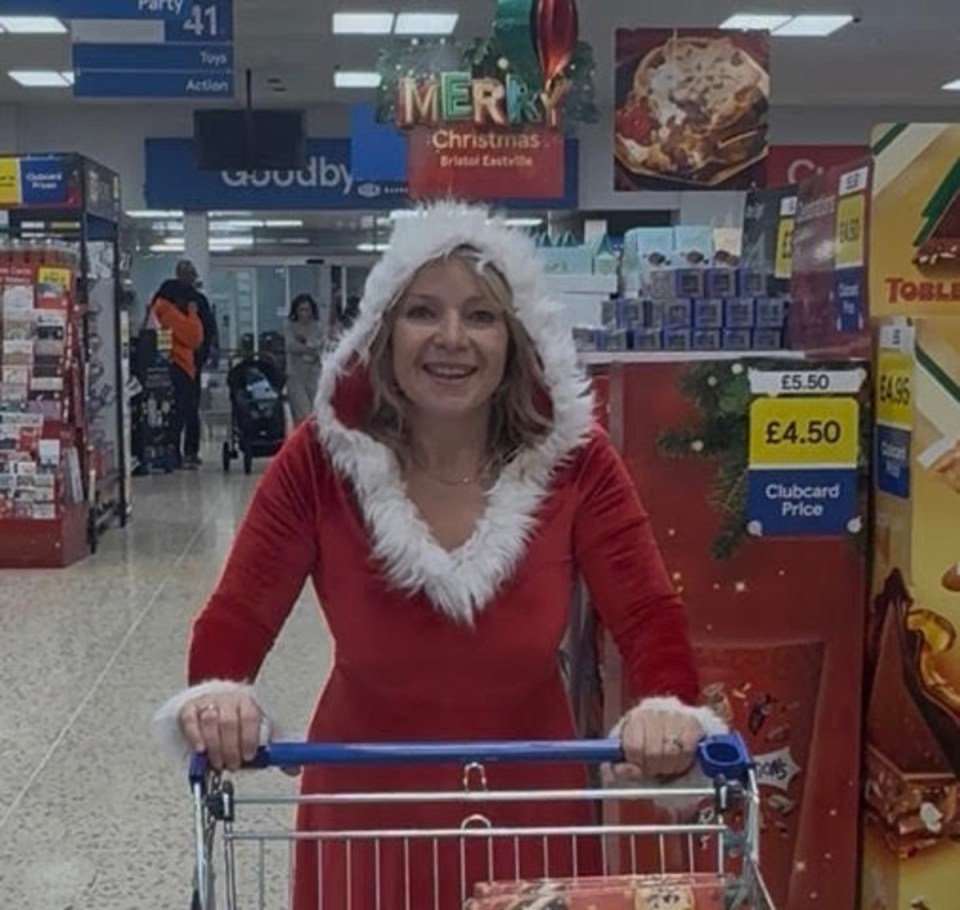 Susannah Streeter speaking at a business conference, addressing financial trends and market insights to an engaged audience.